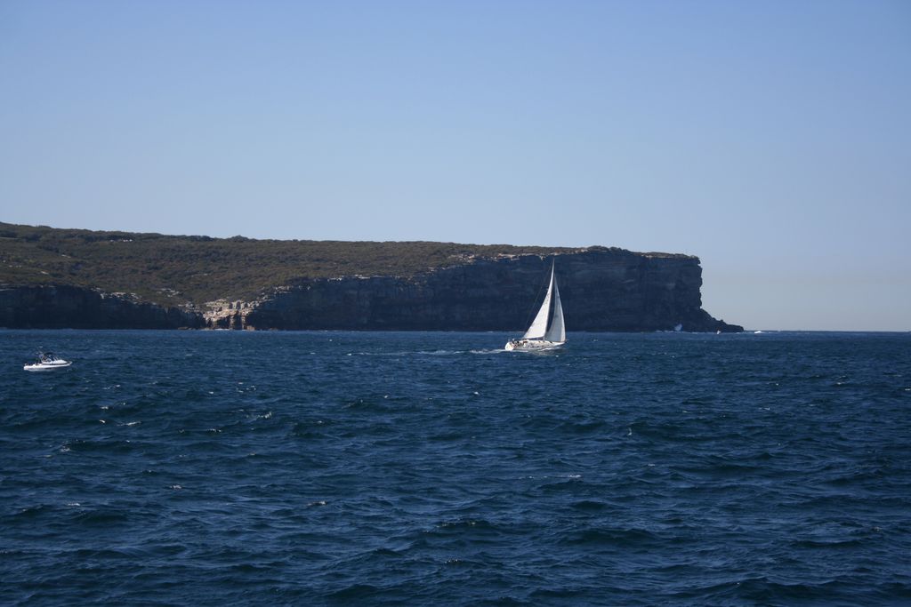 The entrance of the harbour at the ocean (