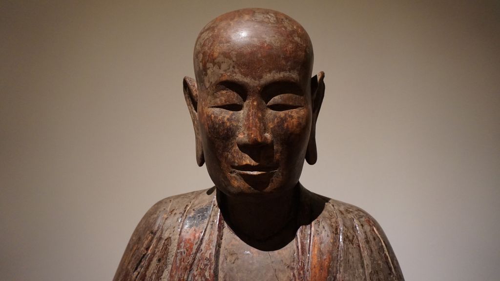 At the Musée Guimet, Paris (statue of a sitting monk, China)